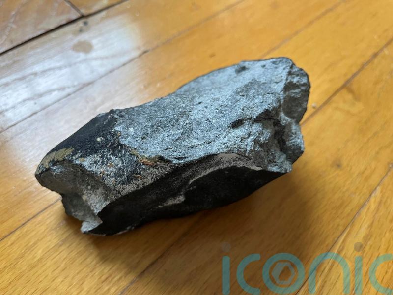 Rock that smashed through house roof was rare meteorite, say scientists