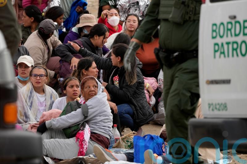 Surge of migrants at US-Mexico border before restrictions are lifted