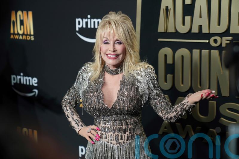 Dolly Parton steals the show at the 2023 ACM Awards with eye-catching outfits