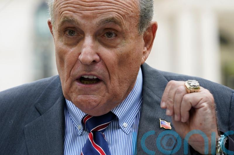 Woman suing Rudy Giuliani for £8m claims he coerced her into sex