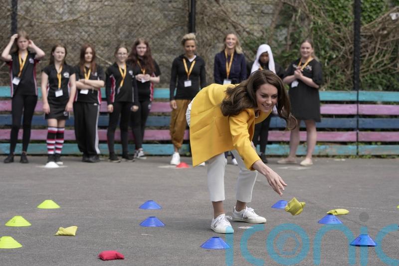 Kate beaten at bean-bag game by double Olympic champion Dame Kelly Holmes