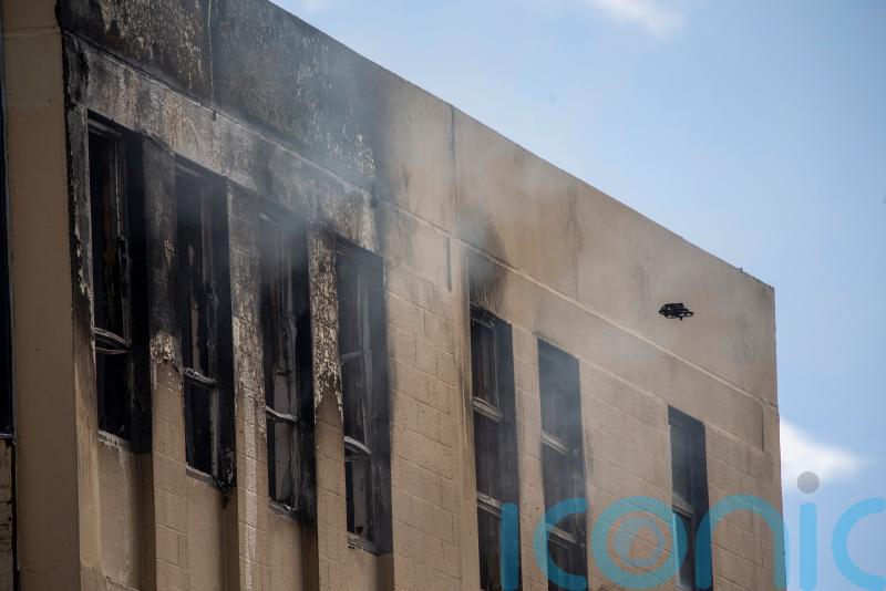Man charged after hostel ‘arson attack’ that killed at least six people