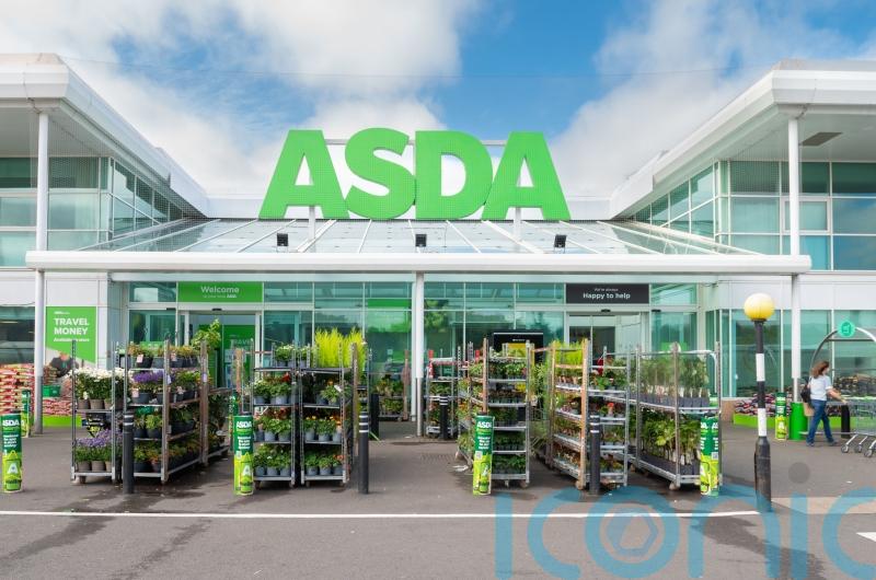 Asda &lsquo;threatening to fire and rehire thousands of workers&rsquo; in pay dispute