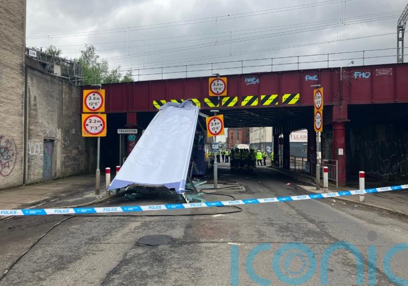 Investigation after double-decker bus hits bridge in Glasgow leaving 10 injured