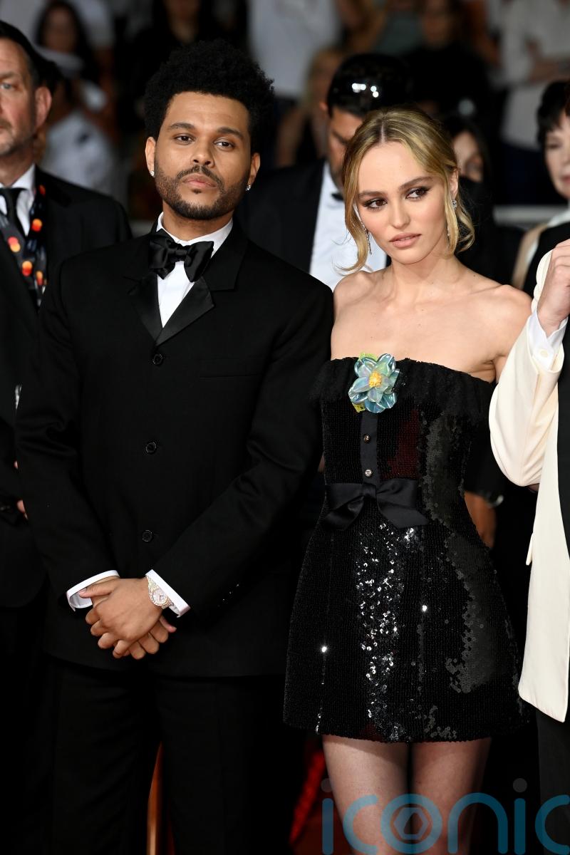 Lily-Rose Depp appears alongside The Weeknd at Cannes Film Festival
