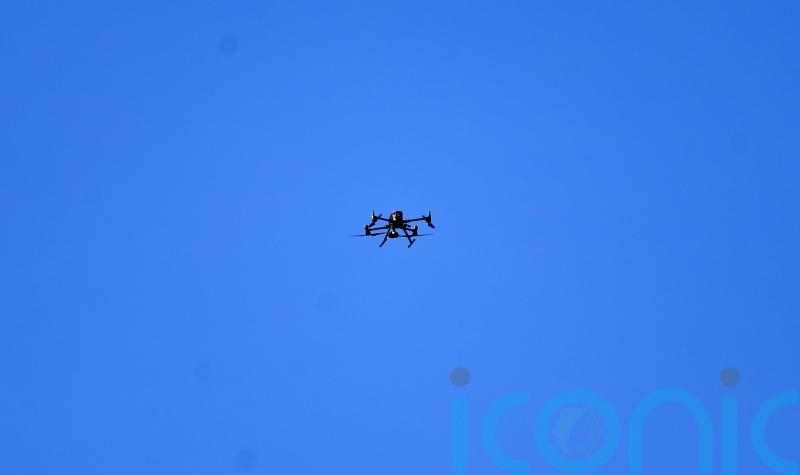 Man charged with flying drone above ground which saw football match halted