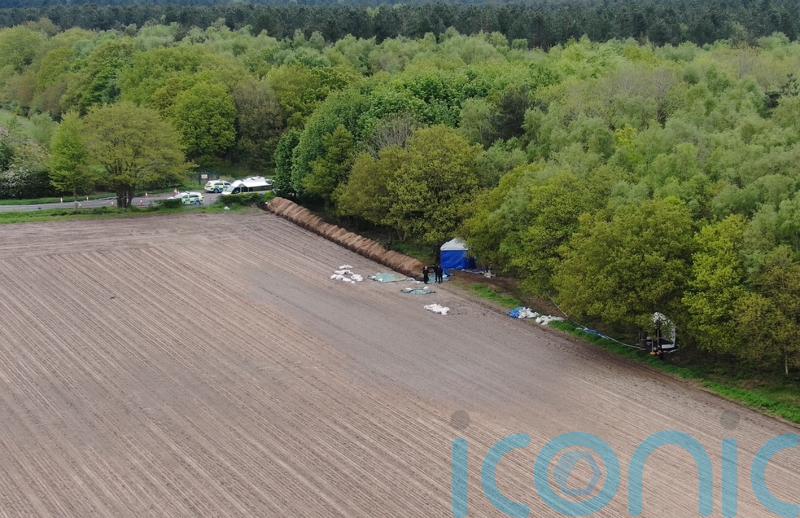 Murder hunt launched as body buried in field confirmed as male ‘trauma’ victim