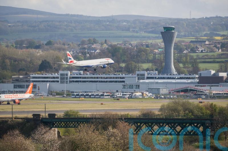 Airport workers back strike action in pay row
