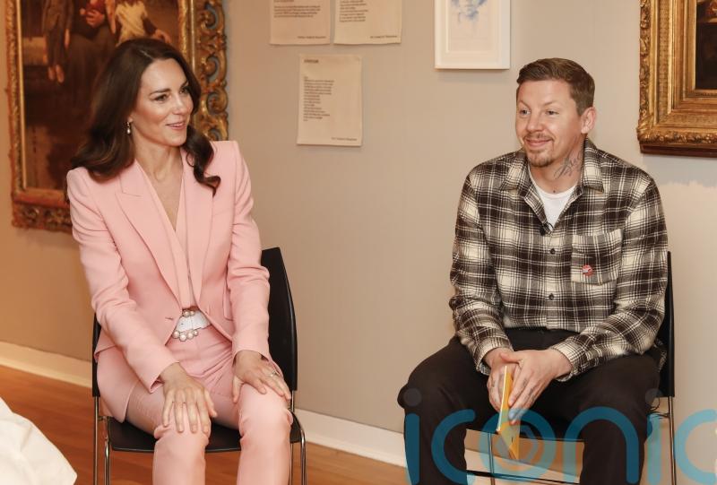 Professor Green introduces Kate to his Nanny Pat at kinship carer celebration