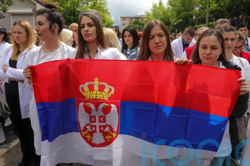 Ethnic Serbs gather in northern Kosovo town after clashes with Nato peacekeepers