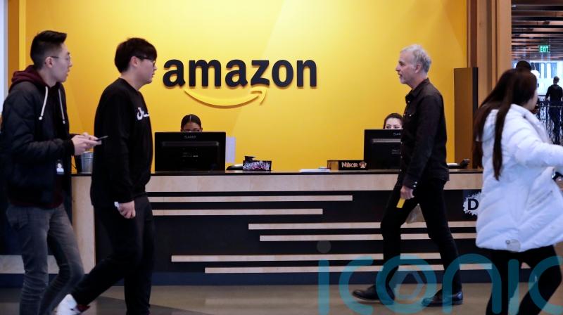 US Amazon workers upset over job cuts stage walkout at HQ