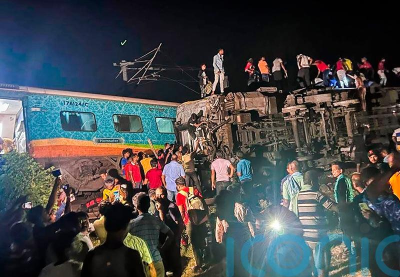 Passenger train derails in India, killing at least 50