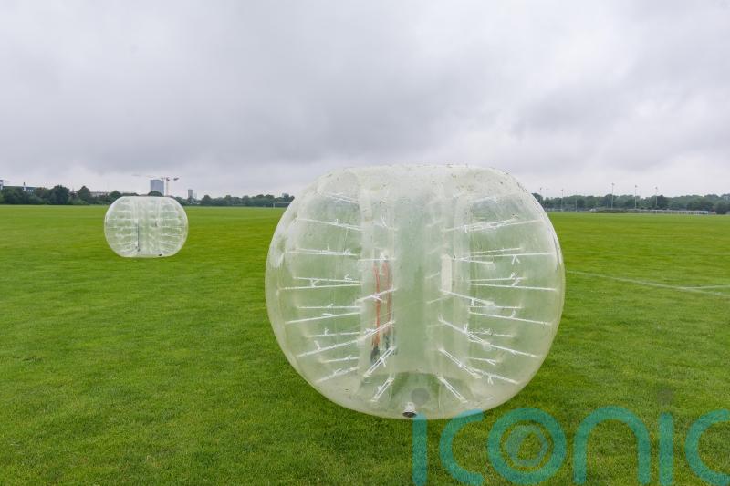 Nine-year-old boy seriously injured as inflatable zorb ball ‘blown off lake’
