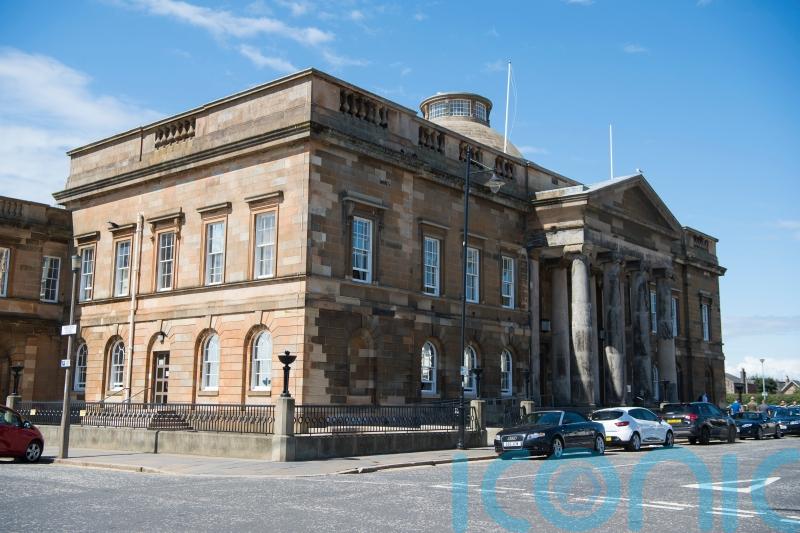 Nineteen to stand trial accused of trying to stop Scottish Grand National