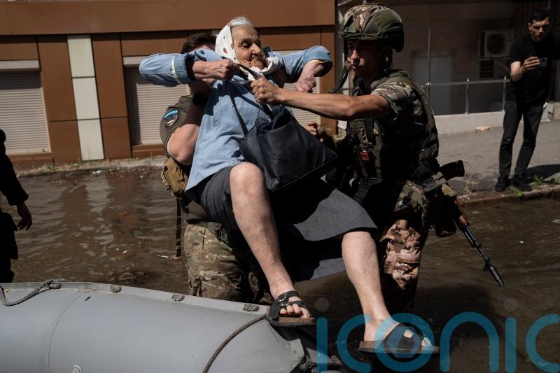 Ukraine rushes drinking water to flooded areas after major dam breach