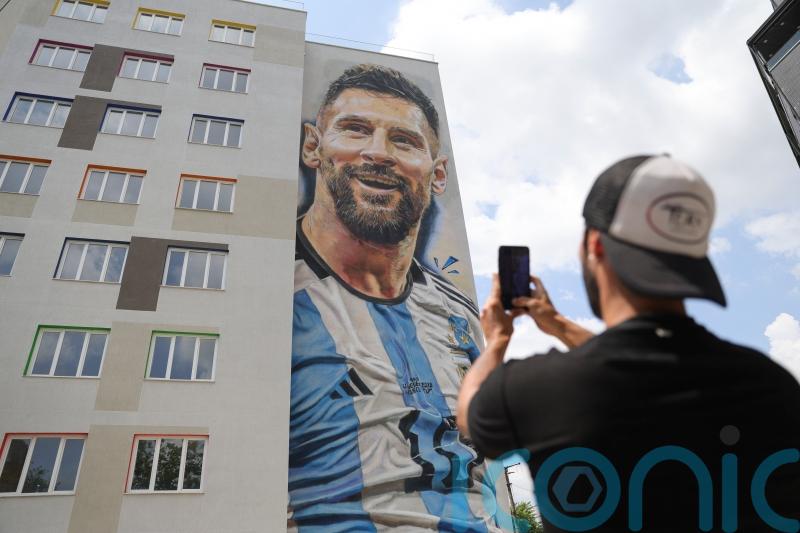 ‘It’s Messi’s moment’: Mural of footballer covers student dormitory in Tirana