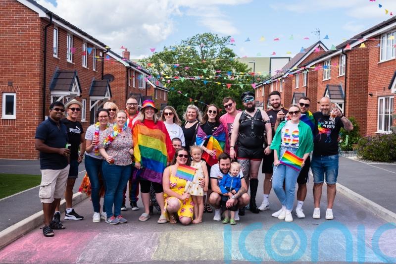 Neighbours prepare for annual 80-metre Pride march in housing estate