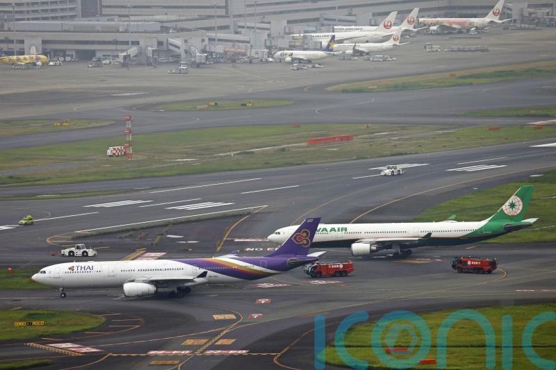 Runway reopens at Tokyo’s Haneda airport after planes ‘bump into each other’