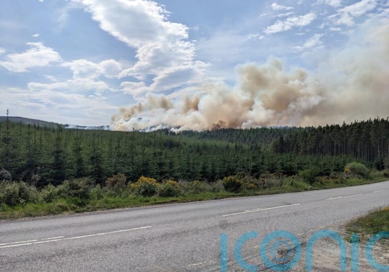 Firefighters continue to tackle raging wildfire in Highlands