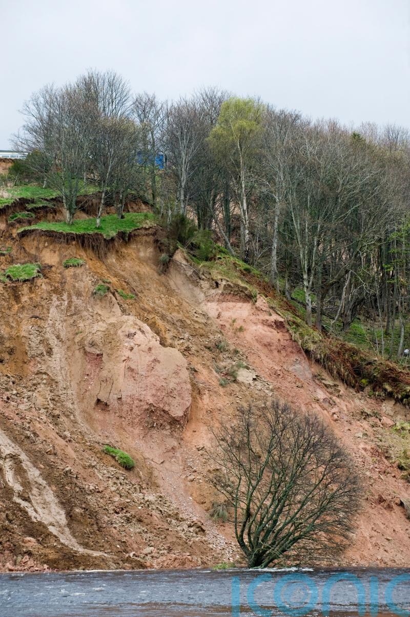Driver rescued after being trapped by landslides in the Highlands