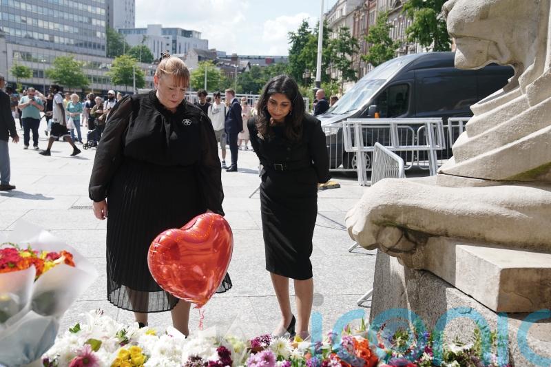 Home Secretary lays wreath to three killed in deadly city rampage