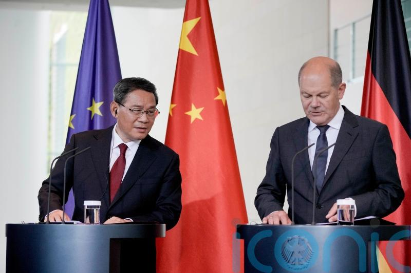 Germany presses China over Ukraine as leaders pledge to work together on climate