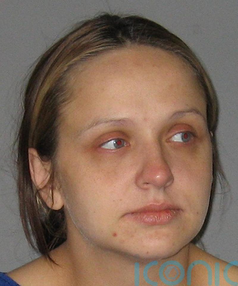 Woman who smothered newborn son sentenced