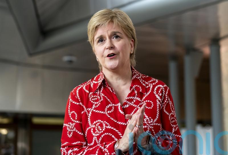 Sturgeon insists she has &lsquo;done nothing wrong&rsquo; on return to Holyrood after arrest