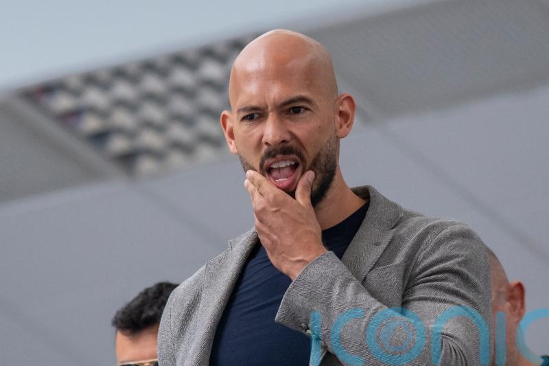 Andrew Tate appears in Romanian court to face rape and human trafficking charges