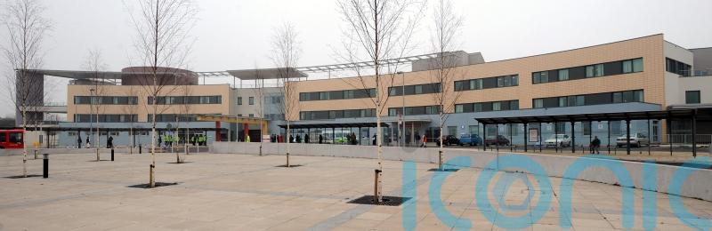 Man arrested after two people stabbed at hospital