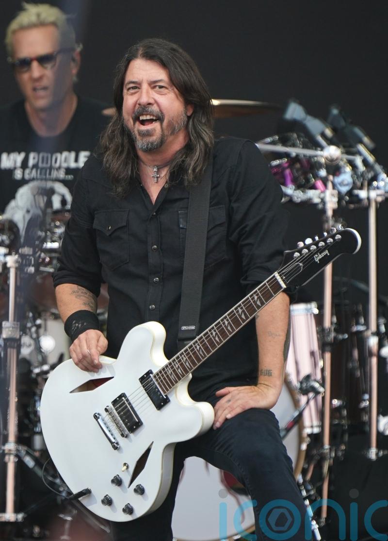 Foo Fighters take train to Glastonbury to perform surprise mainstage set