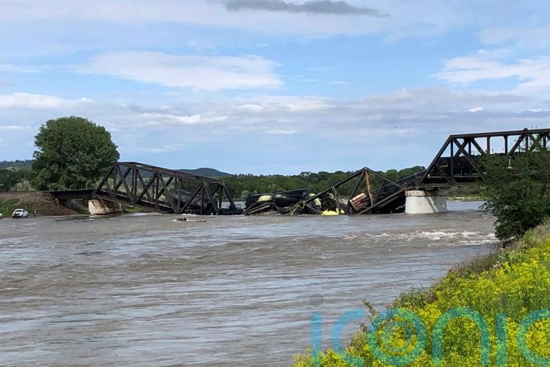 Freight train falls into river after Montana bridge collapse