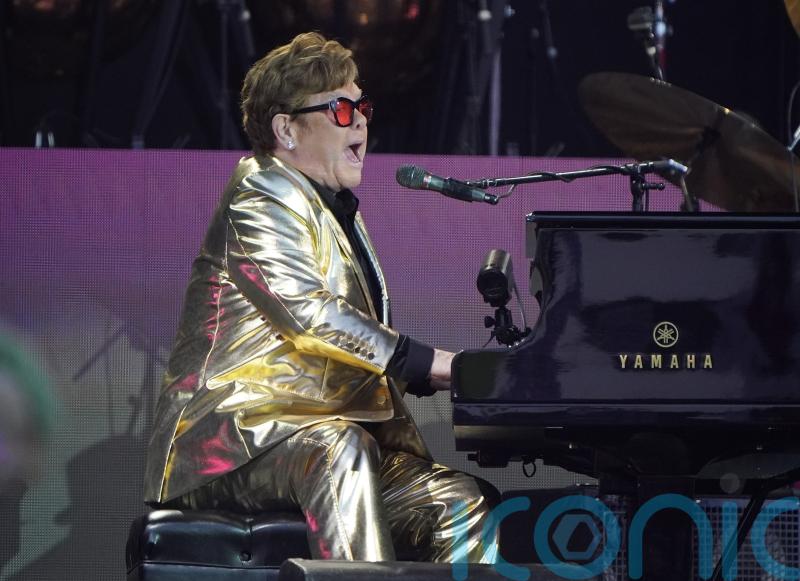Who were Sir Elton John’s surprise musical guests at Glastonbury?