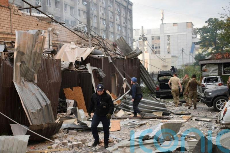 Three children among 10 killed as missile hits pizza restaurant in Ukraine