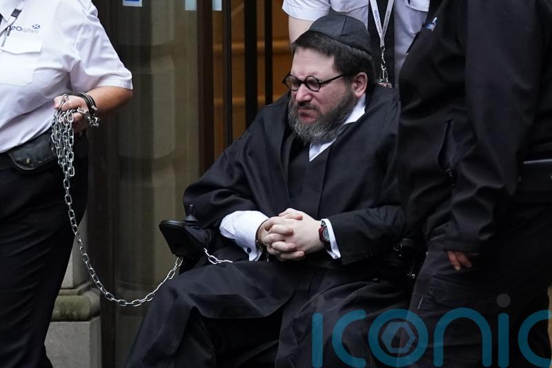 Wheelchair-using rape suspect facing extradition kicked down door, court told