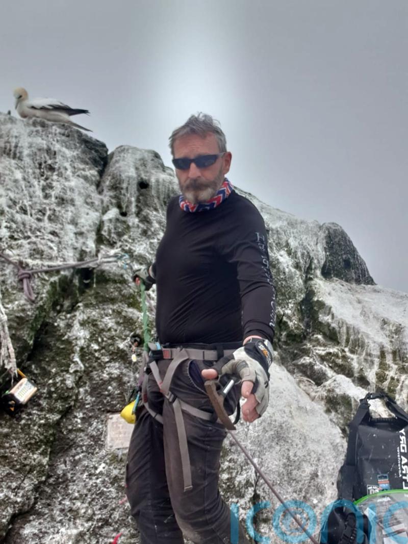 Veteran who hoped to break record for living on Rockall rescued by coastguard