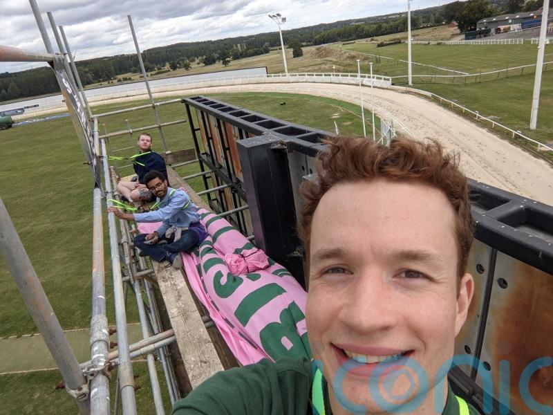 Animal Rising activists scale race track scaffold ahead of Greyhound Derby Final