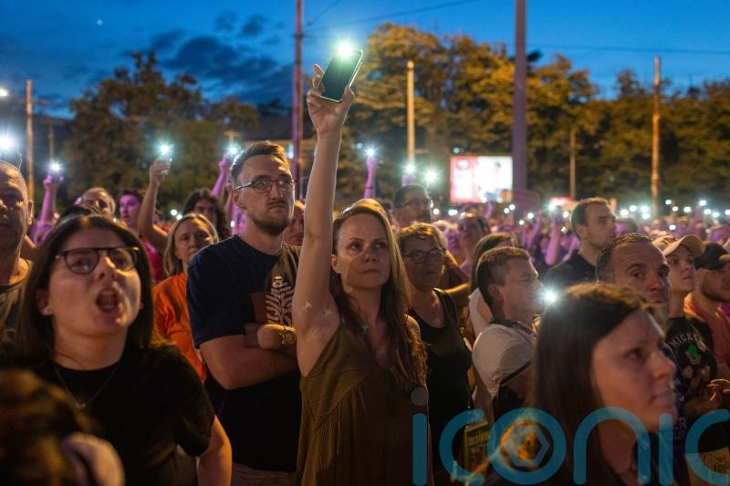 Thousands in demonstration against Serbian TV station after mass shootings