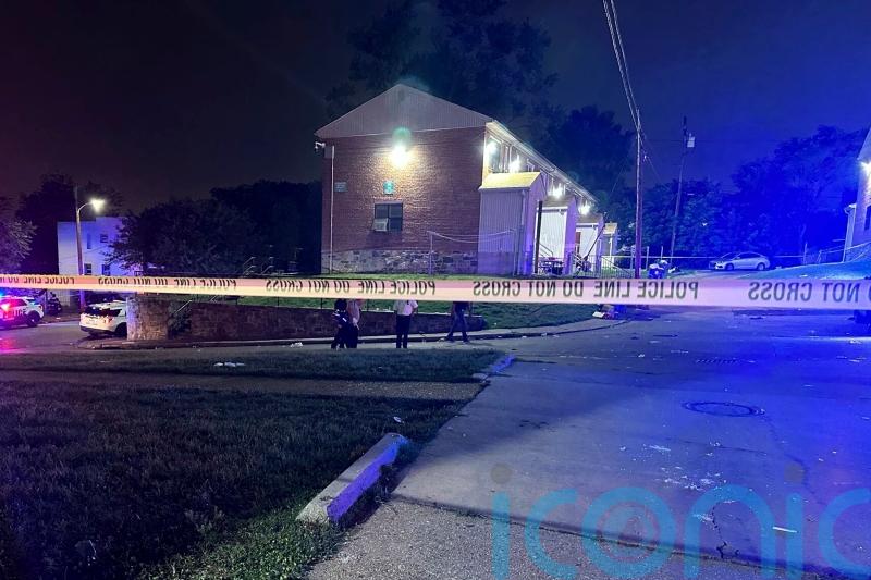 Hunt for suspects after shooting at street party leaves two dead