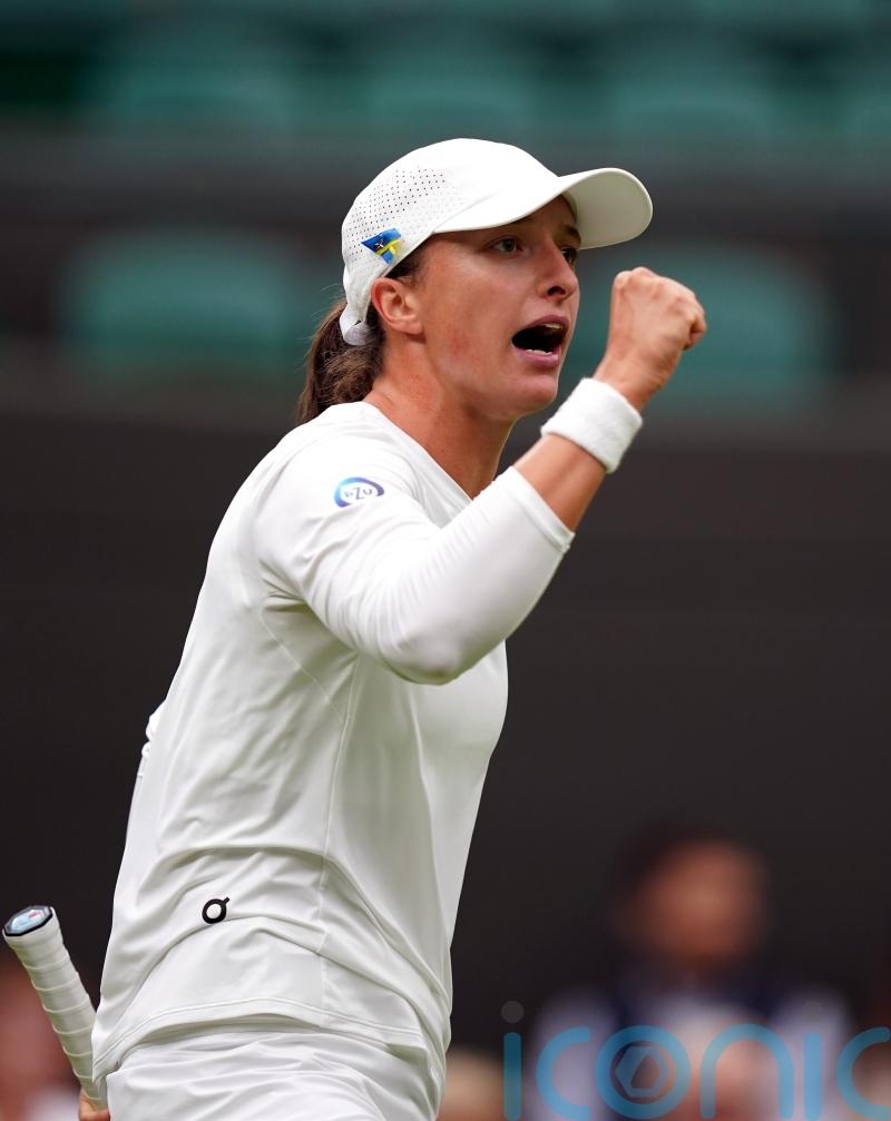 Top seed Iga Swiatek races through first-round match at Wimbledon