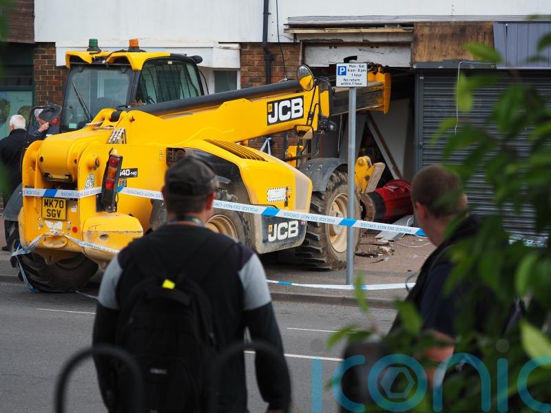 Trains disrupted as man arrested over bid to steal ATM using crane