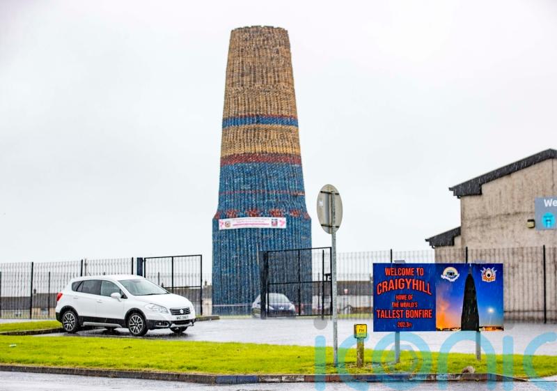 Towering bonfire bears banner to raise money for sick girl