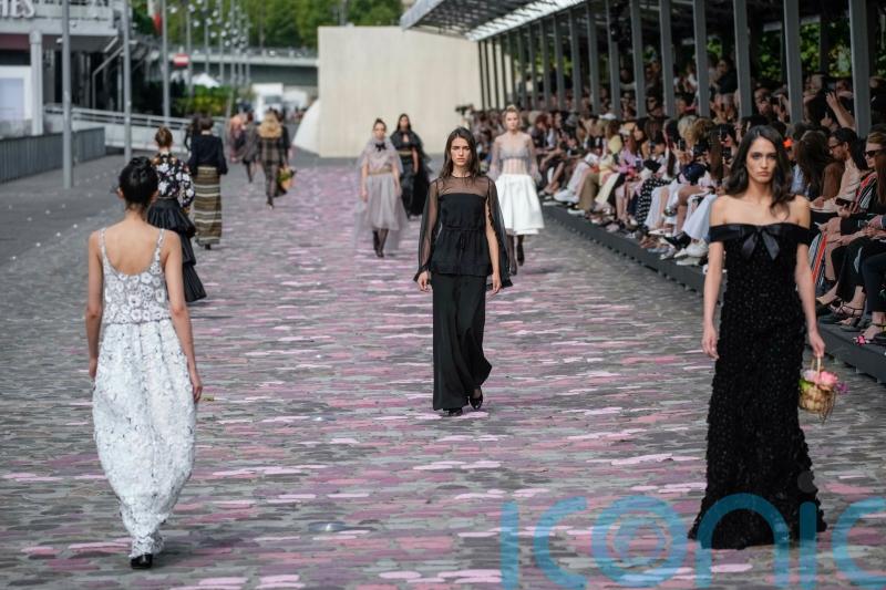 Paris Fashion Week continues to draw stars in riot-hit France