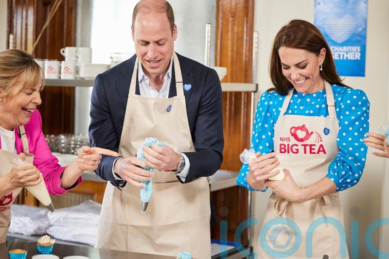 William and Kate drop in for NHS tea party at hospital