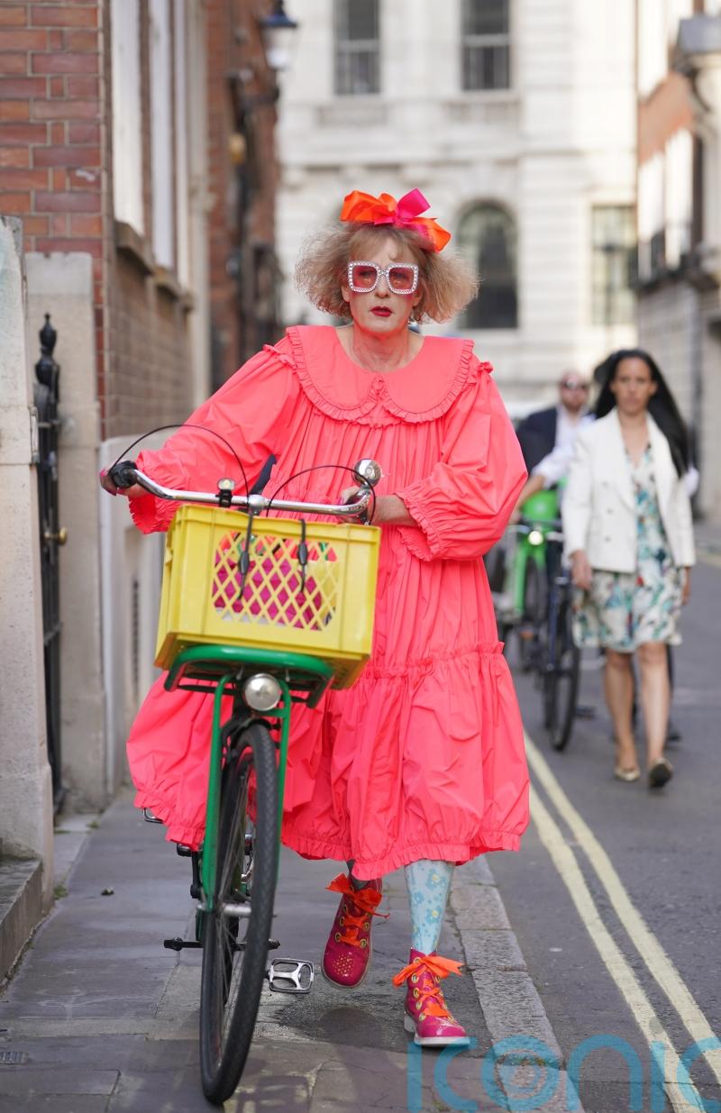Sir Grayson Perry dons neon, tiered baby-doll dress for Spectator summer party