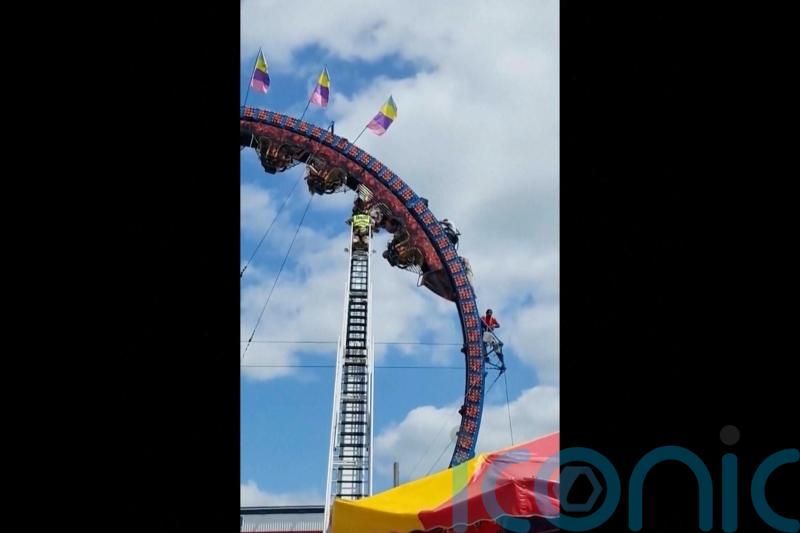 Riders trapped upside down for hours on rollercoaster