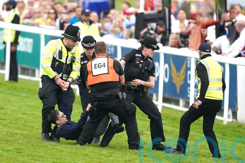 Animal rights activist who ran on to track at Epsom ‘endangered’ security
