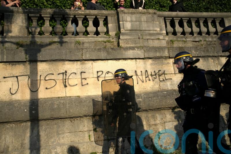 Macron says France needs to address causes of unrest prompted by police killing