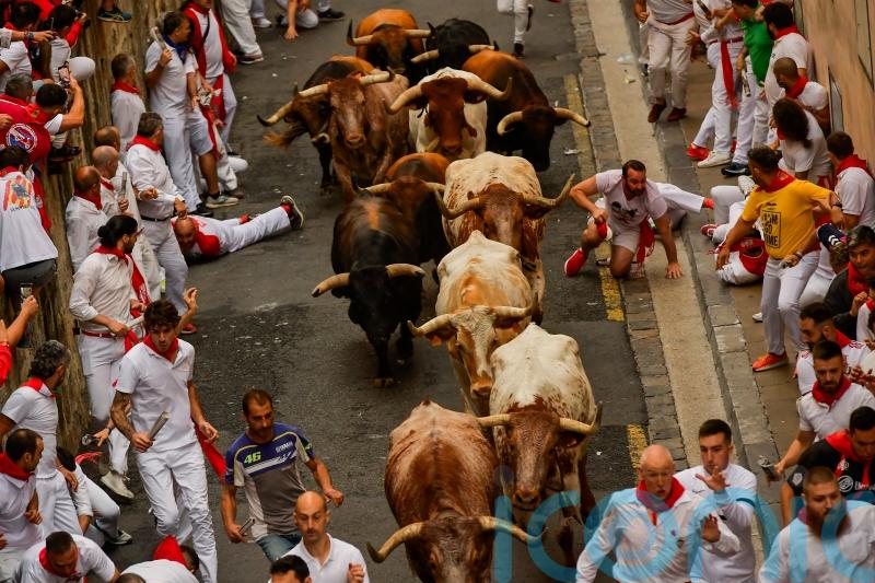 Thousands take part in first running of the bulls in annual San Fermin Festival