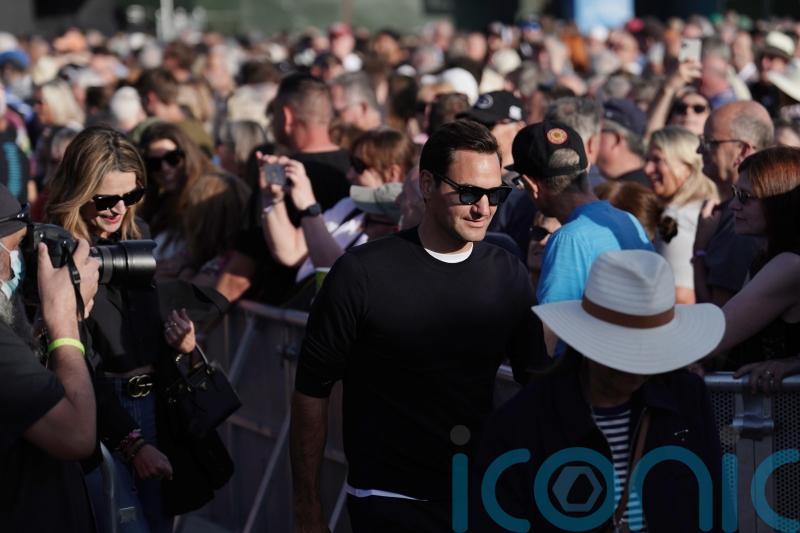 Roger Federer joins fans for Bruce Springsteen BST performance